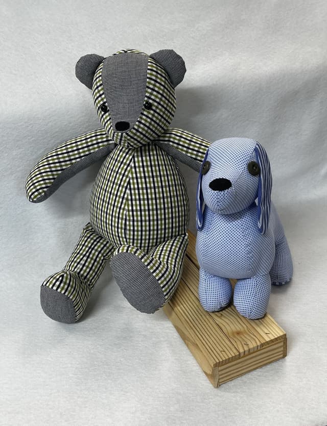 A memory bear and a memory dog sewn from checked and striped shirts